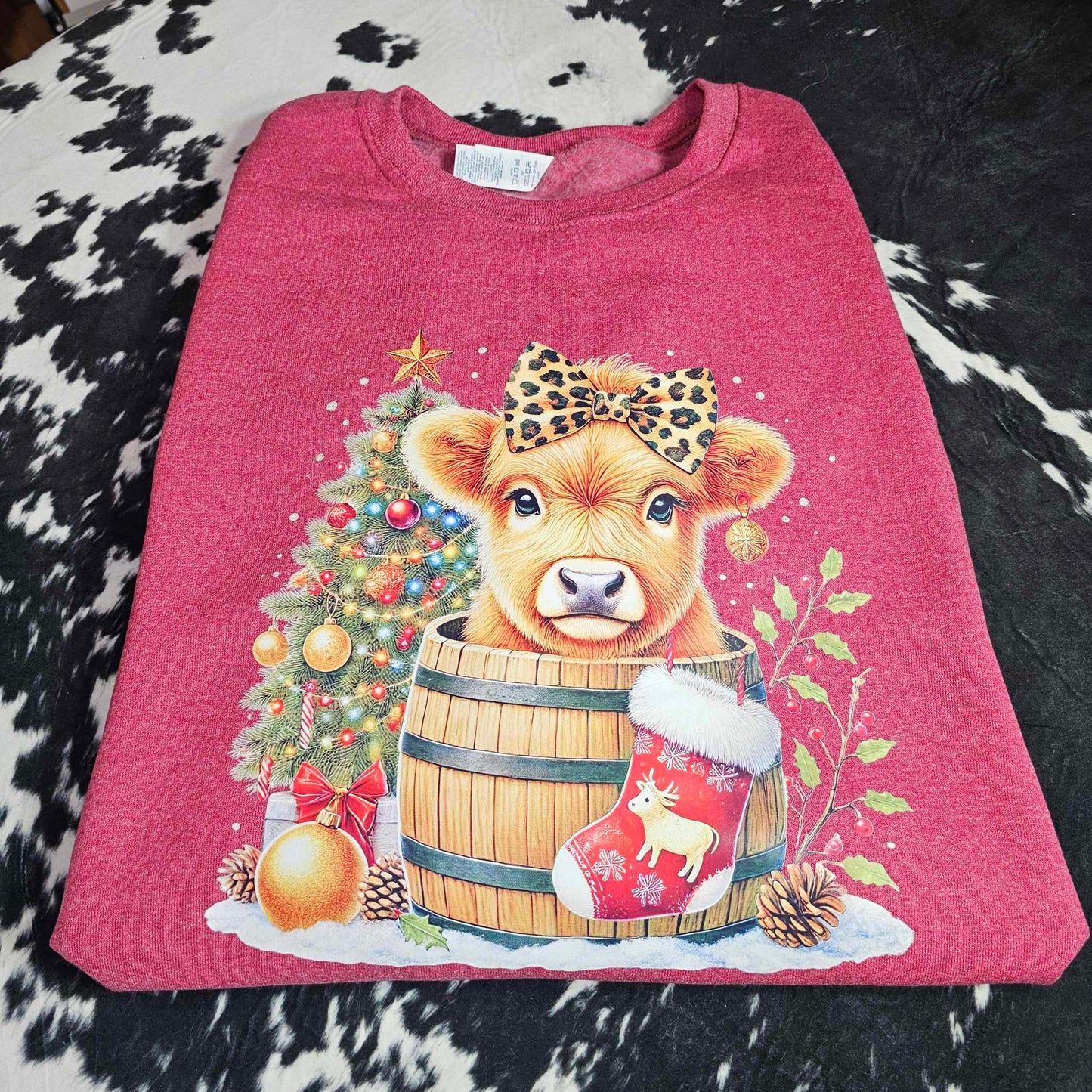 Christmas crewneck sweatshirt with festive calf illustration